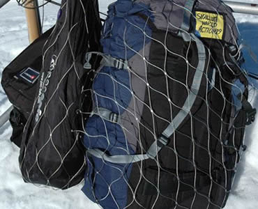 Backpack locked with stainless steel rope mesh on a fixture
