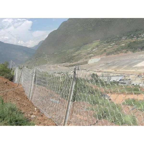 Rockfall barrier anchor and cable
