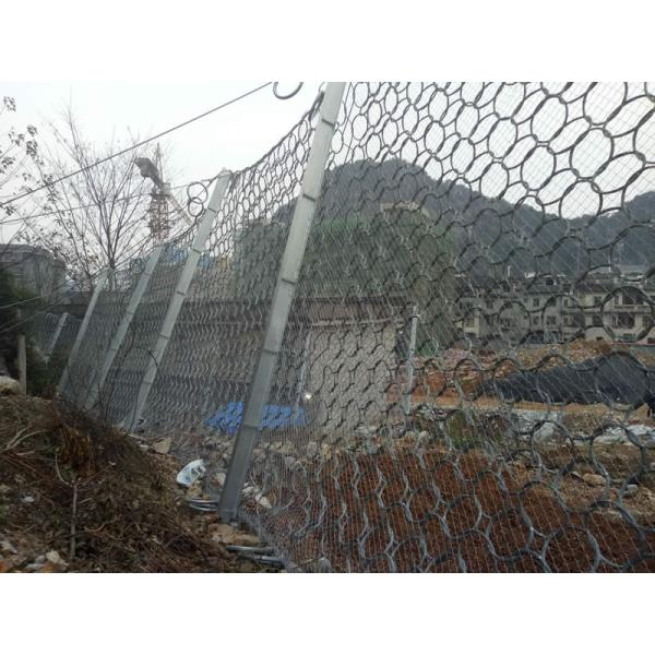 Rockfall barrier along roadside slope