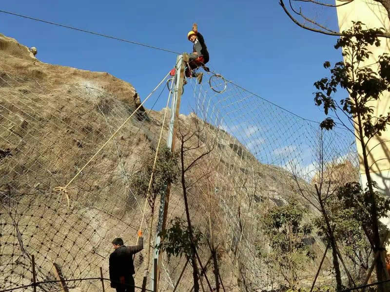 Long section of RX passive rockfall barriers following road alignment
